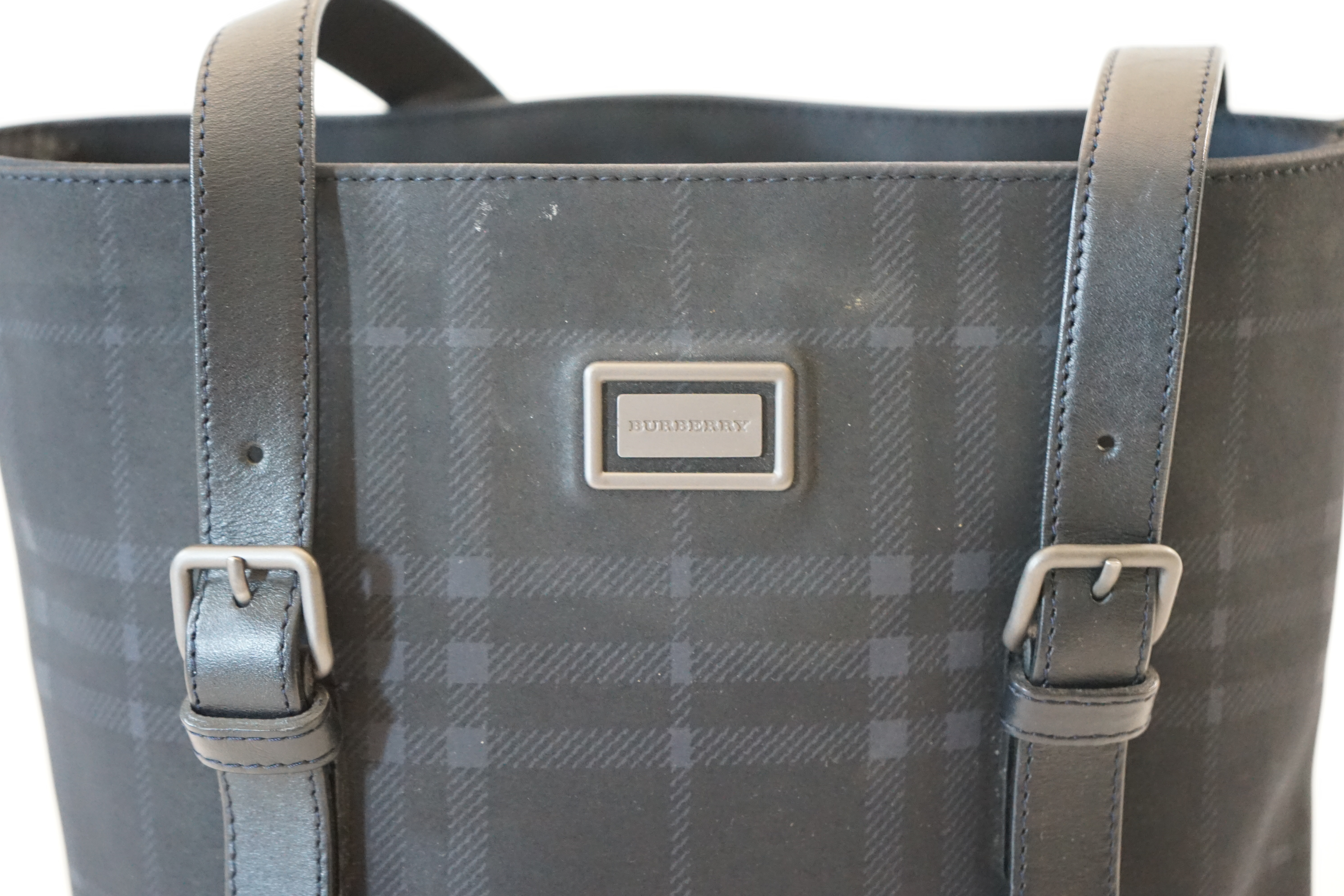 A Burberry bucket bag in blue black tartan canvas and leather, width 26cm, depth 16cm, height 27cm